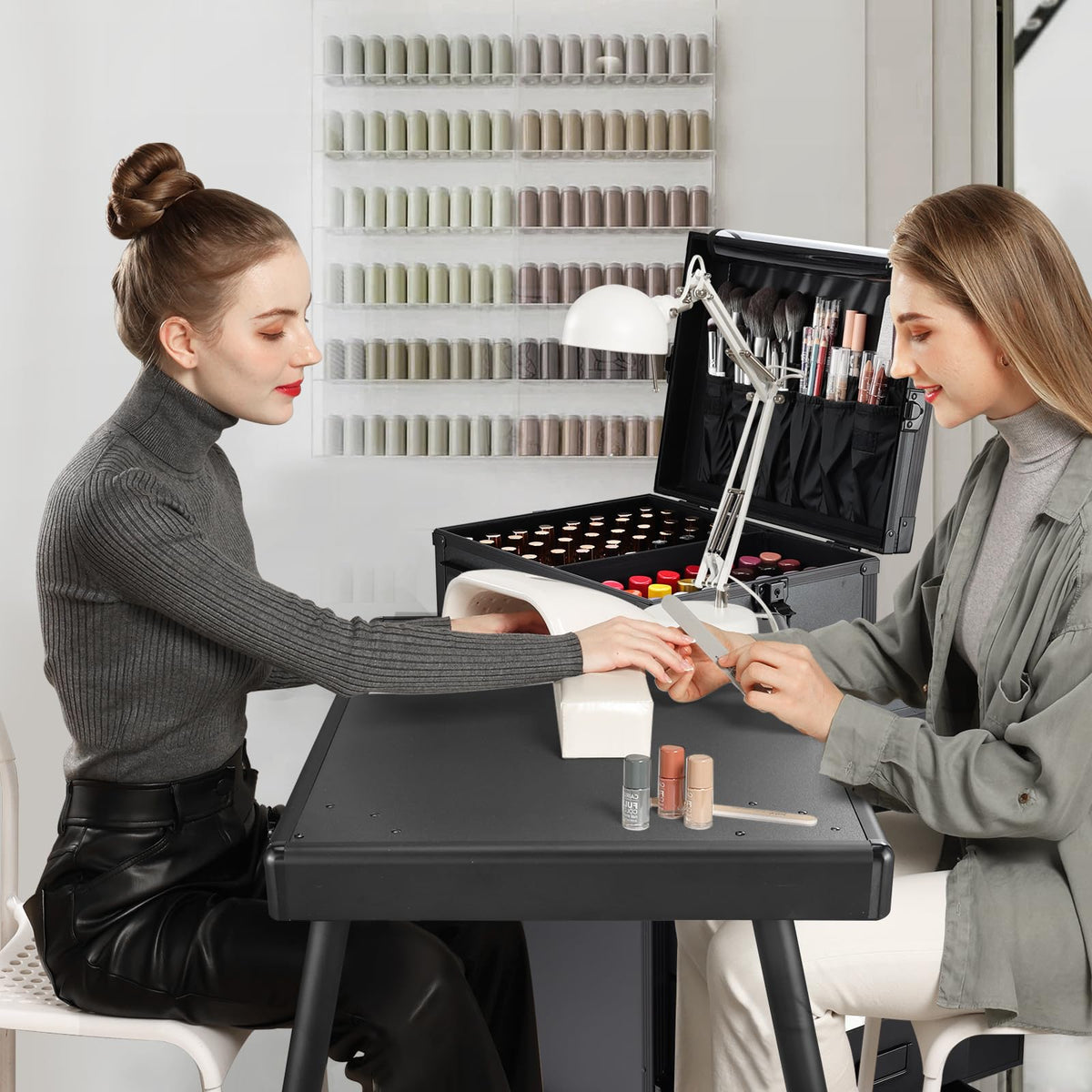 Joligrace foldable nail table showing adjustable height for versatile setups