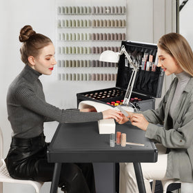 Joligrace foldable nail table showing adjustable height for versatile setups