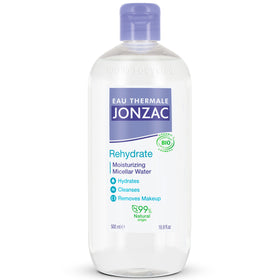 Jonzac Eau Thermale Micellar Water bottle pouring for gentle cleansing on sensitive skin.