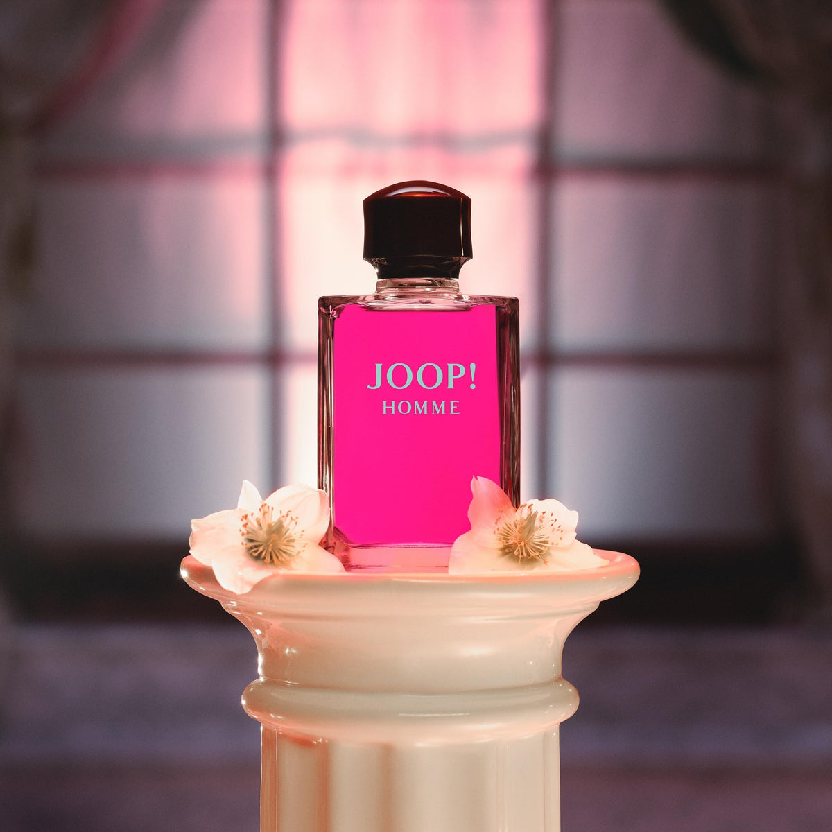 JOOP! Homme bottle glow highlights daring fuchsia packaging and premium feel