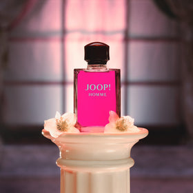 JOOP! Homme bottle glow highlights daring fuchsia packaging and premium feel