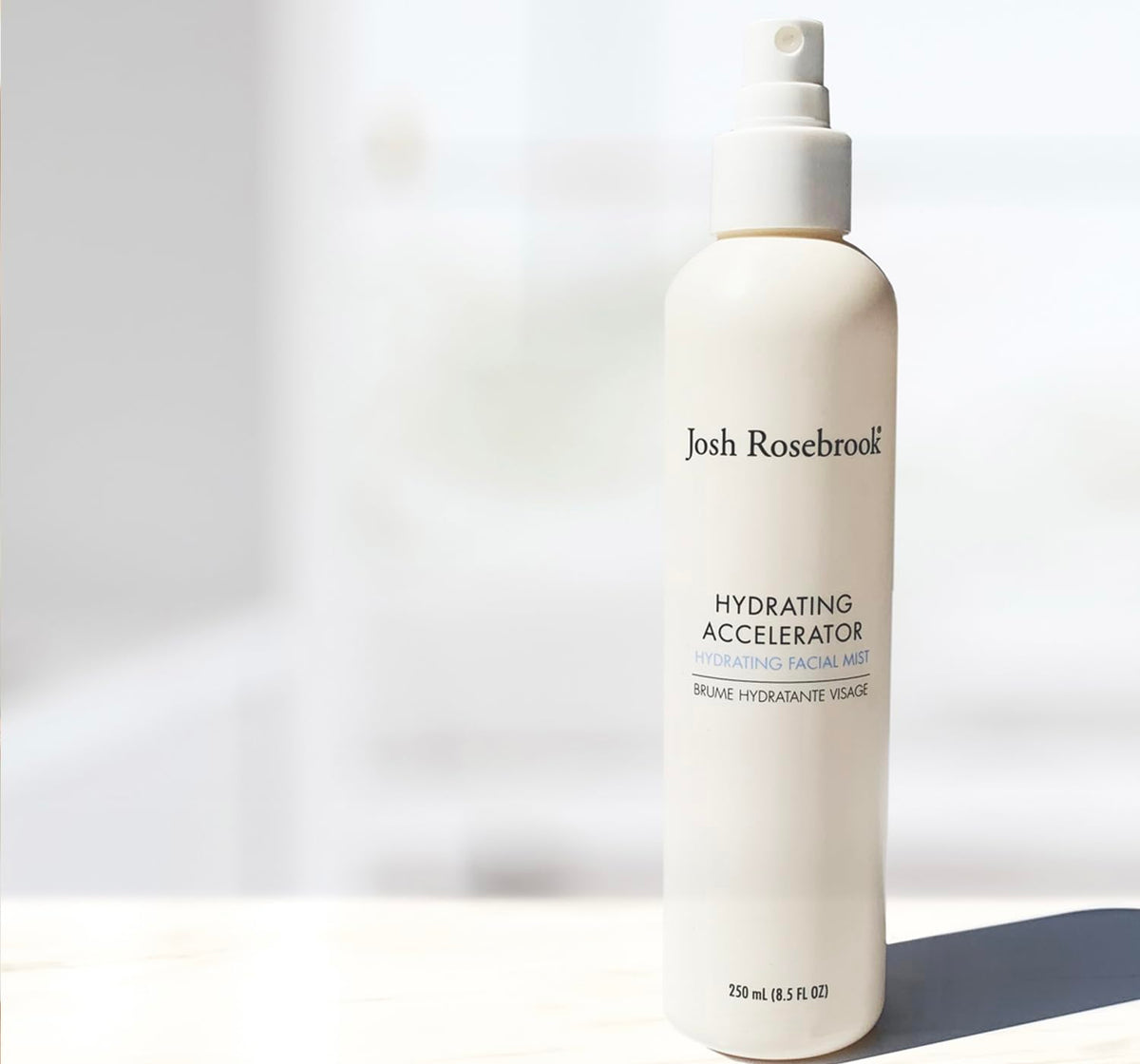 Close-up of cap on Hydrating Accelerator, showcasing easy spray.