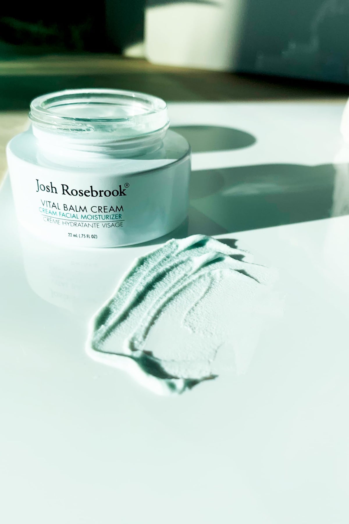 Josh Rosebrook Vital Balm Cream ingredients closeup with botanicals and sustainable actives.