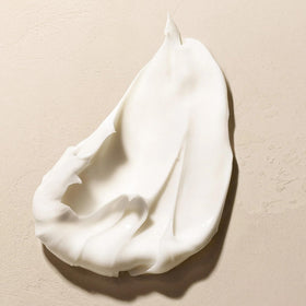 Cruelty-free label and sustainable packaging of Josie Maran conditioner visible.