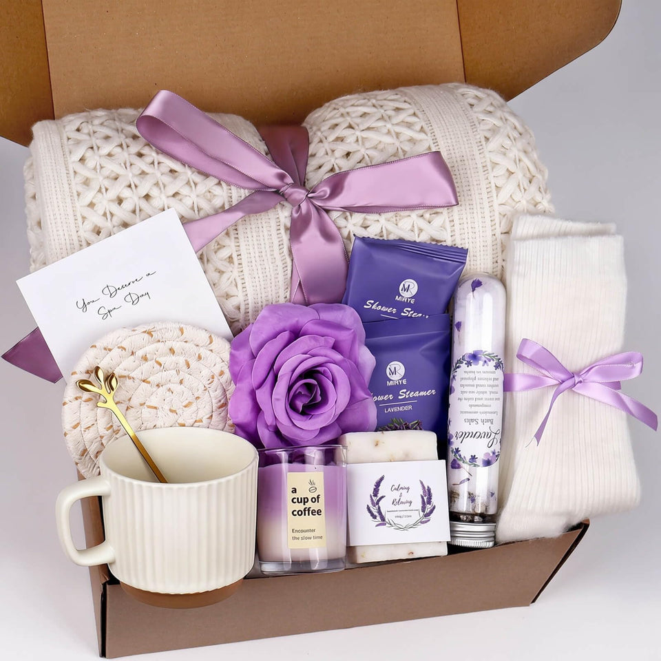 Joyvella lavender candle creates a calming atmosphere for a relaxing self-care moment.