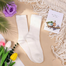 Joyvella soft knitted blanket offers cozy warmth and a comforting hug.