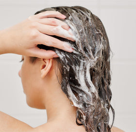 Close-up of rich lather from J.R. Watkins Daily Hydration Shampoo