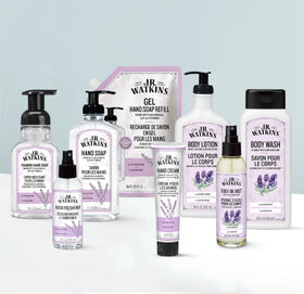 Lavender blossoms beside J.R. Watkins Body Oil Mist for calming aroma.