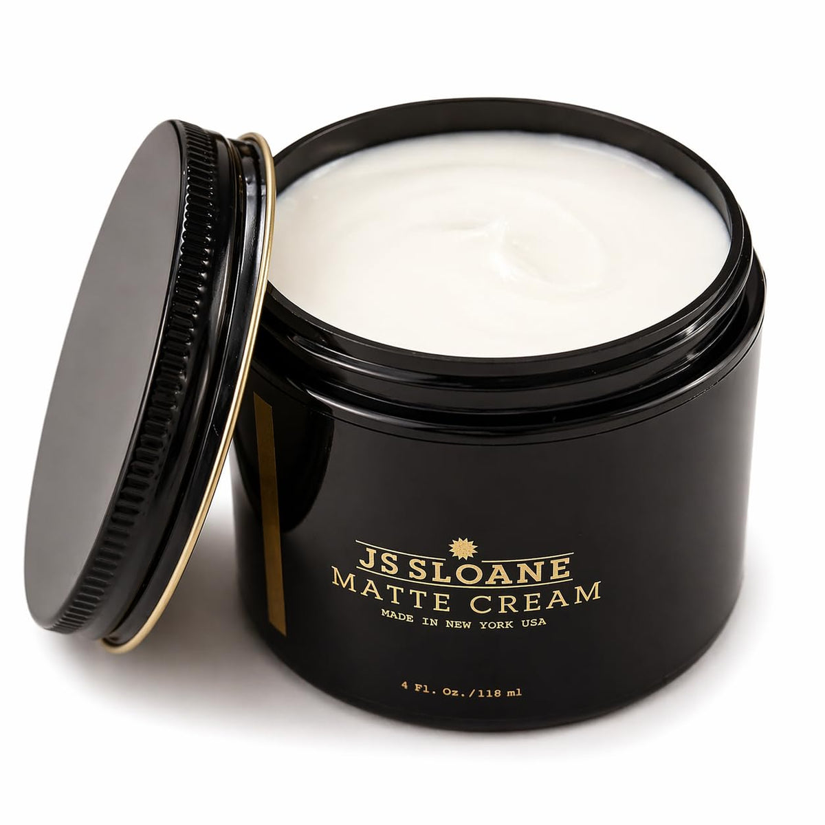JS Sloane Matte Cream hand dispense demonstrates easy application and texture