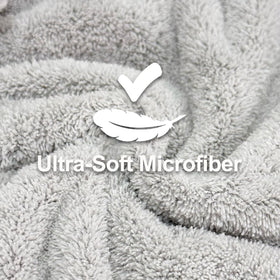 Jseng microfiber hair towel in light gray with secure bow for slip-free use.