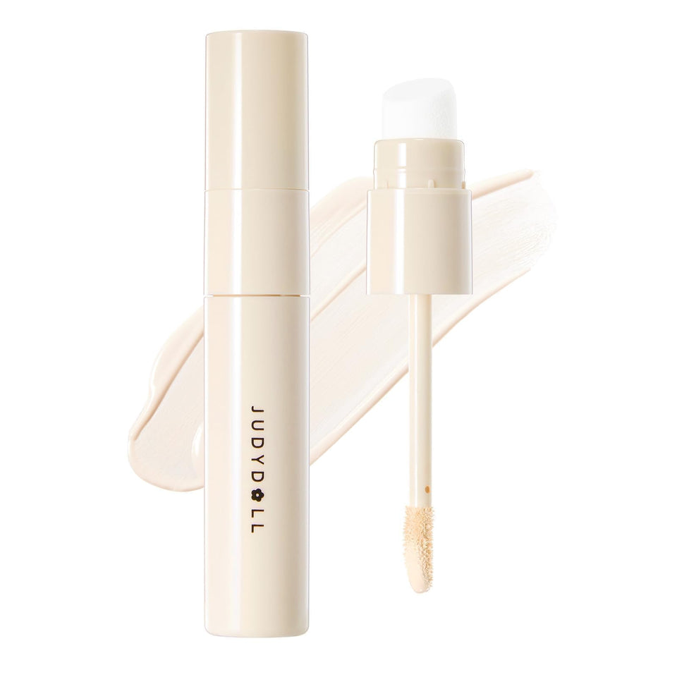 JUDYDOLL liquid contour and highlighter bottle showing natural shadows and soft glow