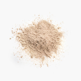 Juice Beauty Flawless Finishing Powder brush-dusting shows sheer, luminous coverage in action.