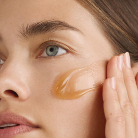 Juice Beauty lifestyle image of relaxed person wearing mask for self-care
