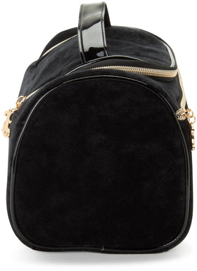 Juicy Couture durable zippered travel bag keeps contents secure while traveling.