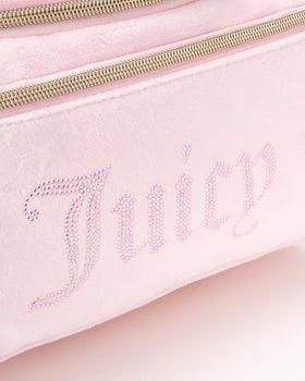 Juicy Couture pink makeup bag hanging strap for easy access in hotels