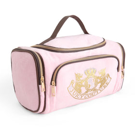 Juicy Couture pink makeup bag interior lining shows organized storage.