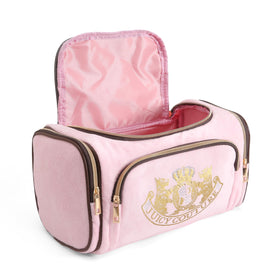 Juicy Couture rhinestone crown accent adds glam to travel kit.
