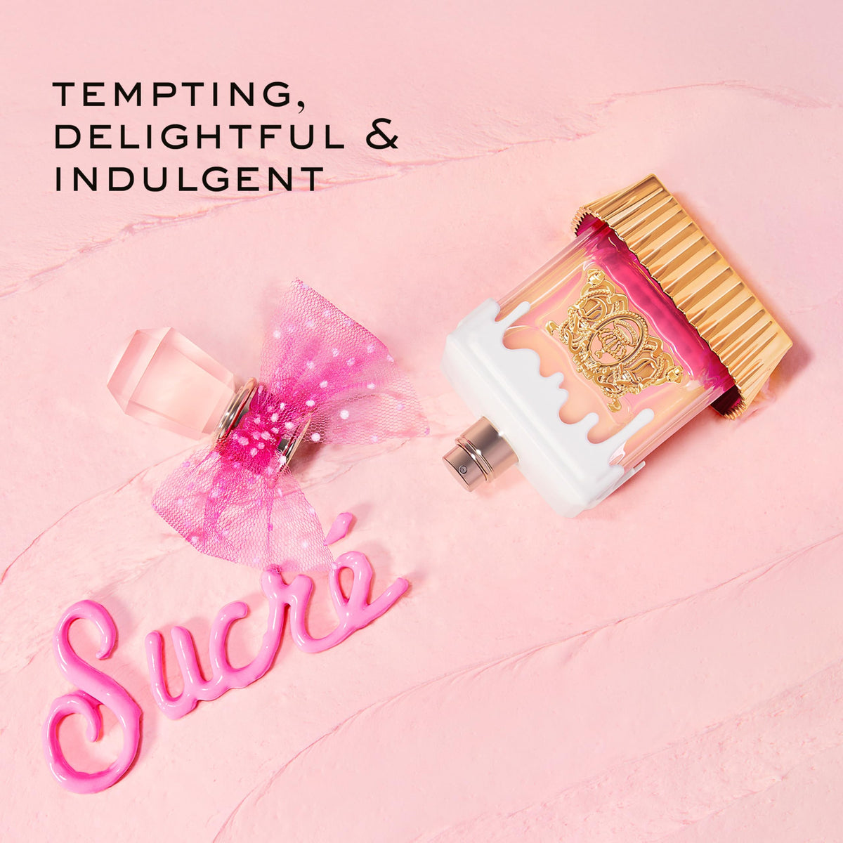Display of Juicy Couture travel spray pens arranged for easy access