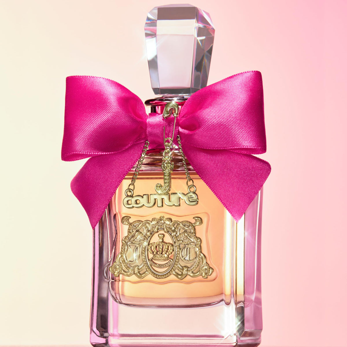 Juicy Couture Viva La Juicy display shot evokes party-ready fragrance lifestyle.