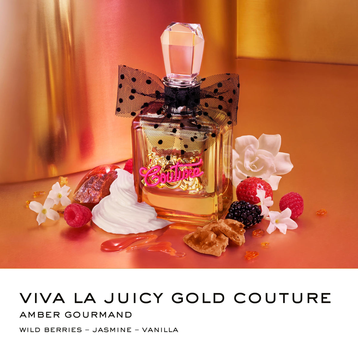 Close-up of the gold plaque and pink bow on Viva La Juicy Gold bottle, packaging ready for occasions.