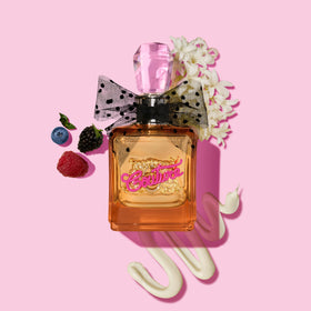 Juicy Couture Viva La Juicy Gold label and branding, eye-catching on shelf.