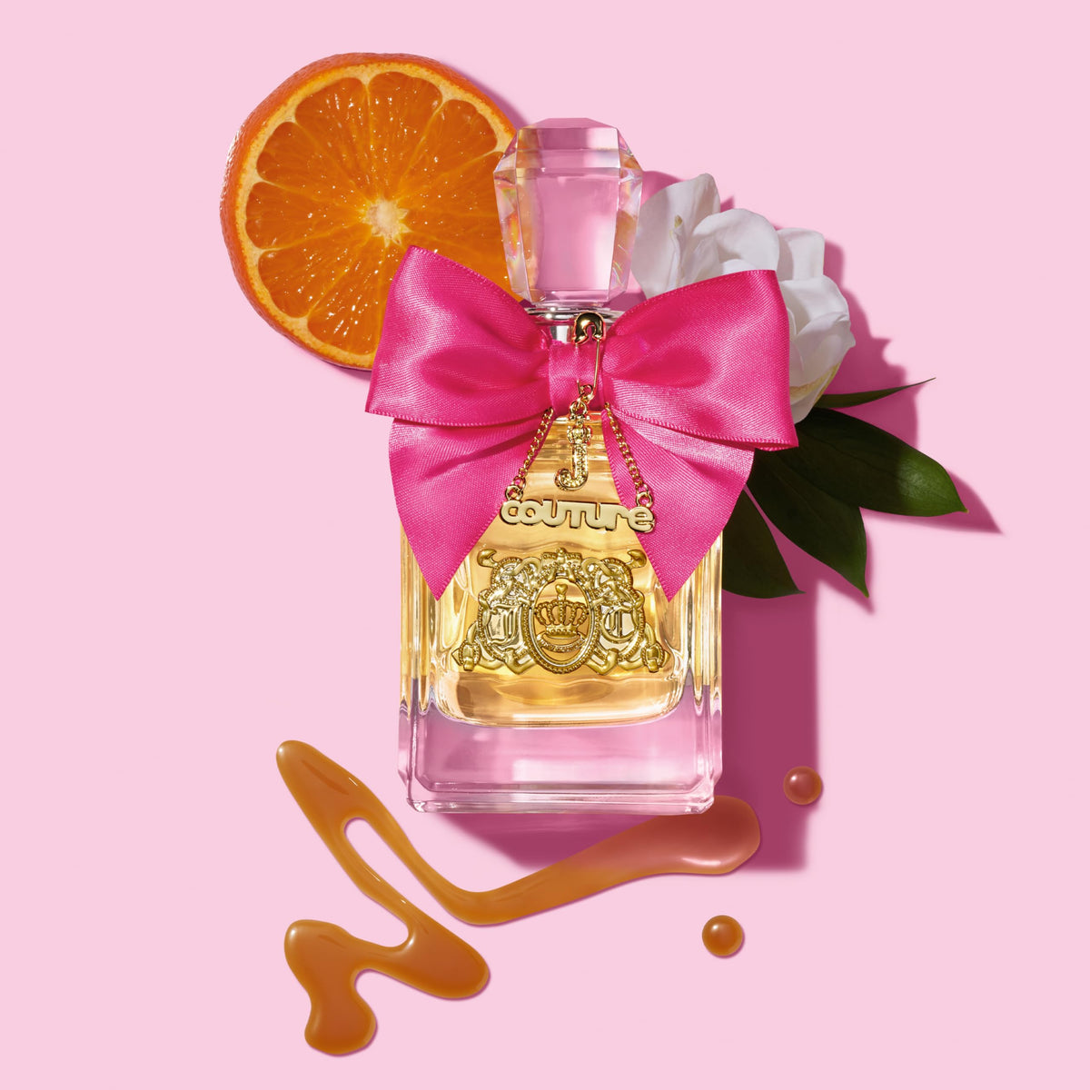 Boxed travel kit with two Juicy Couture fragrances for versatile wear.