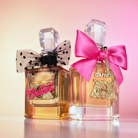 Viva La Juicy Gold bottle spritz on wrist, easy daily use for a luminous touch.