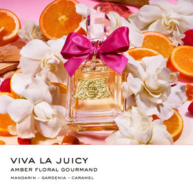 Juicy Couture Viva La Juicy Sucré bottle closeup shows creamy dessert-inspired aroma.