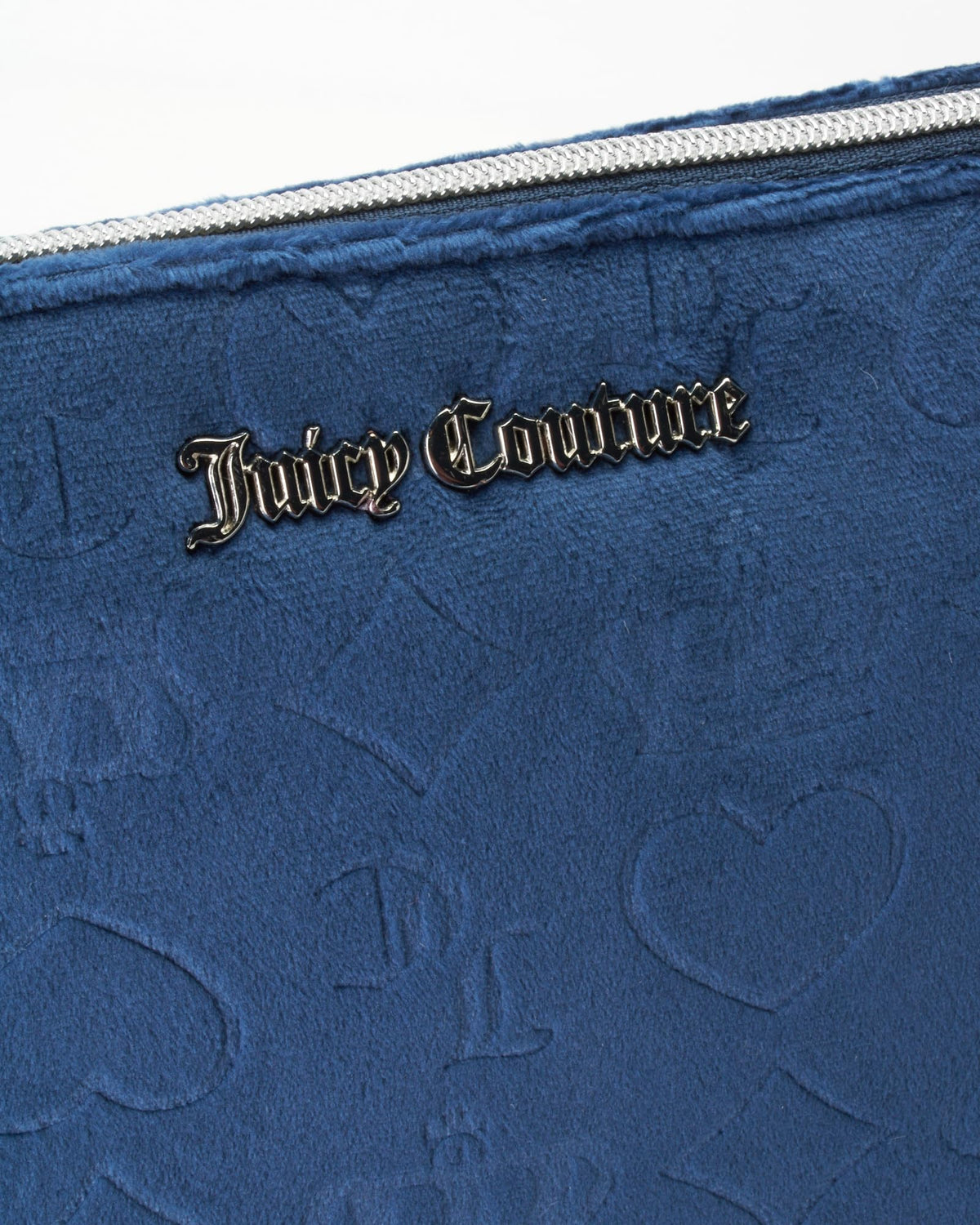 Elegant Juicy Couture design blends fashion with practical travel storage