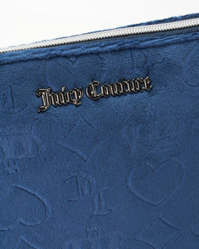 Elegant Juicy Couture design blends fashion with practical travel storage