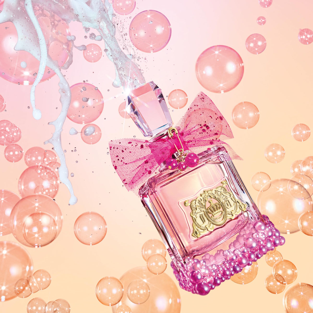 Champagne-note accents on Juicy Couture Le Bubbly bottle hint at sparkling top notes