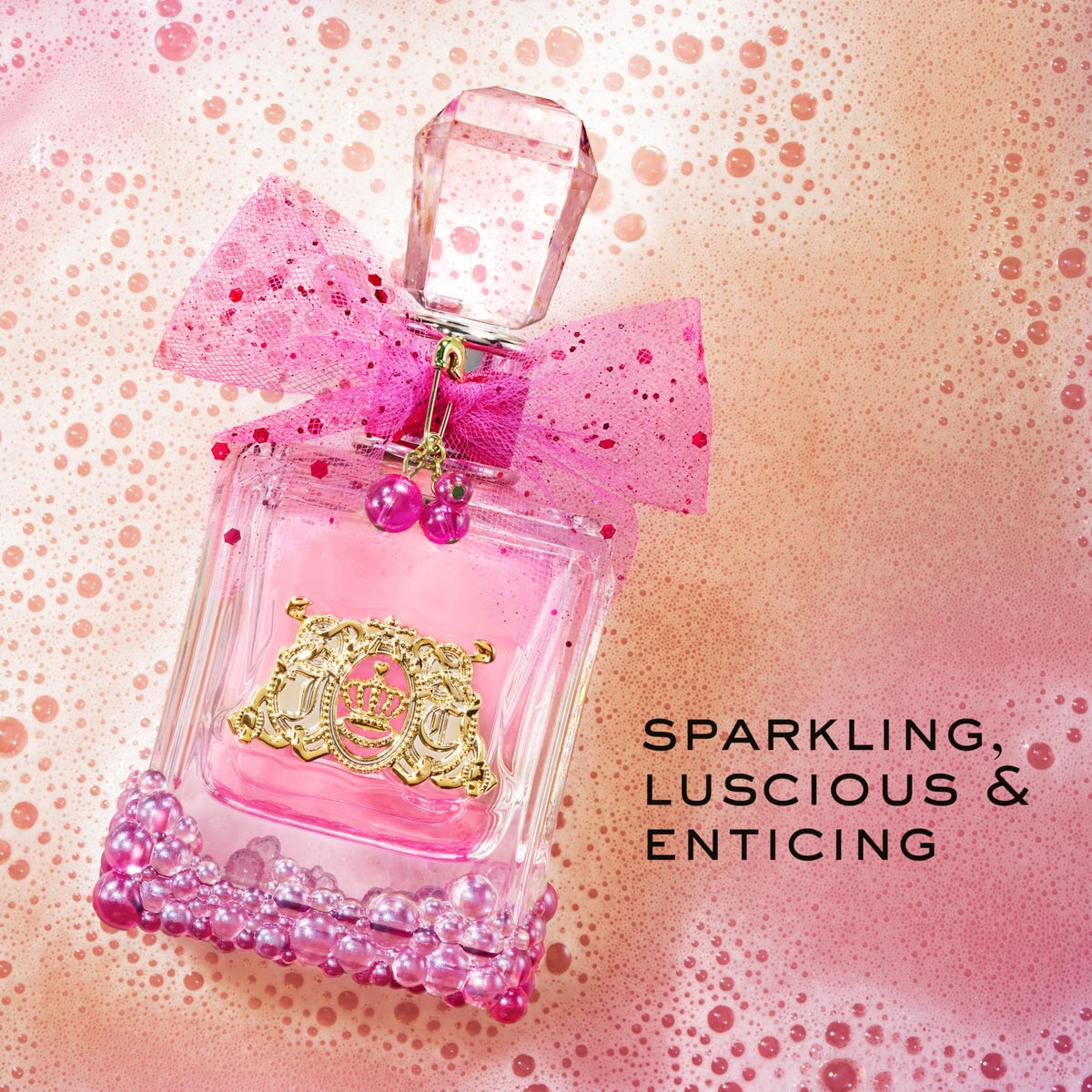Juicy Couture Viva La Juicy Le Bubbly pink mesh bow for festive flair