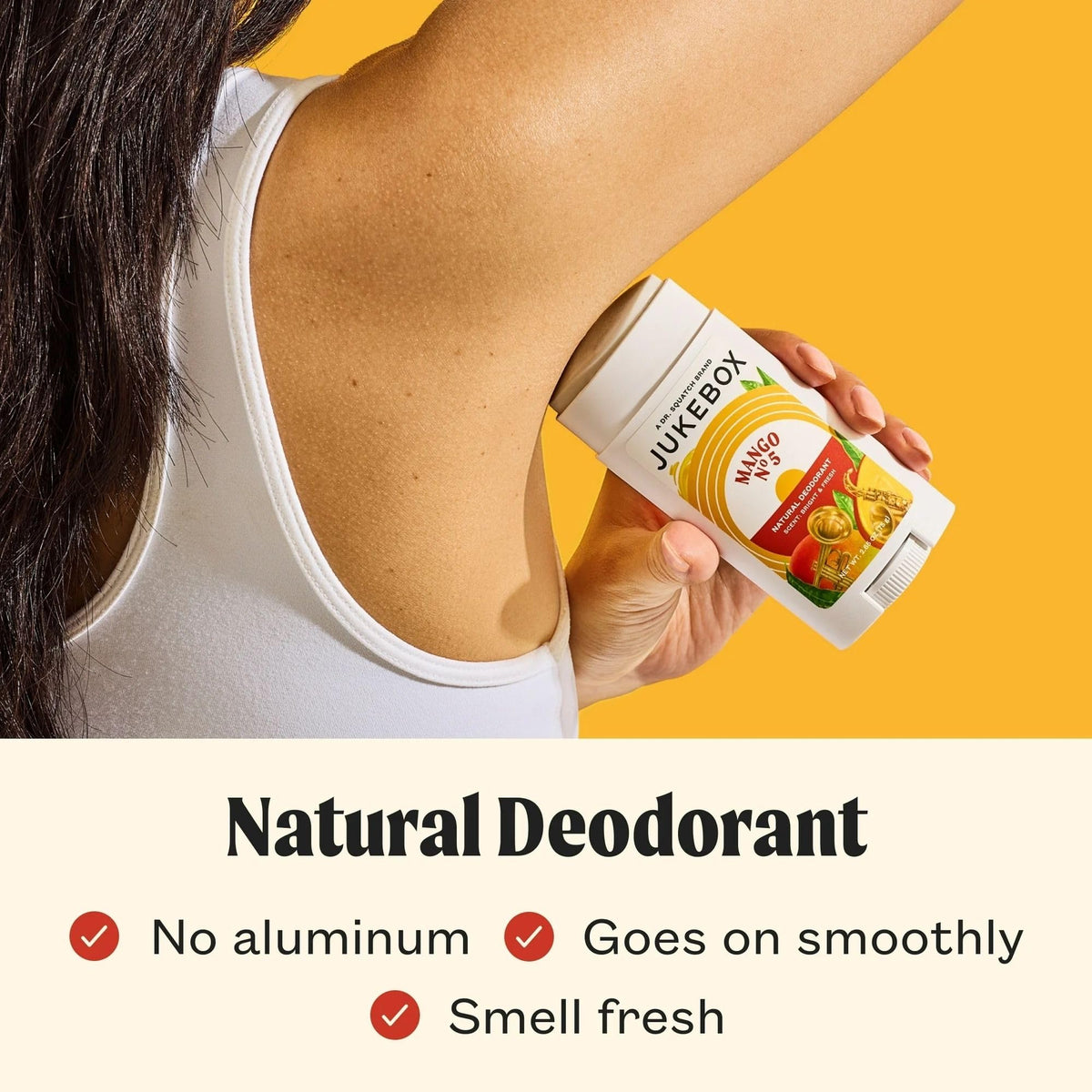 JUKEBOX Mango No.5 deodorant being applied with smooth, fragrance-filled glide.