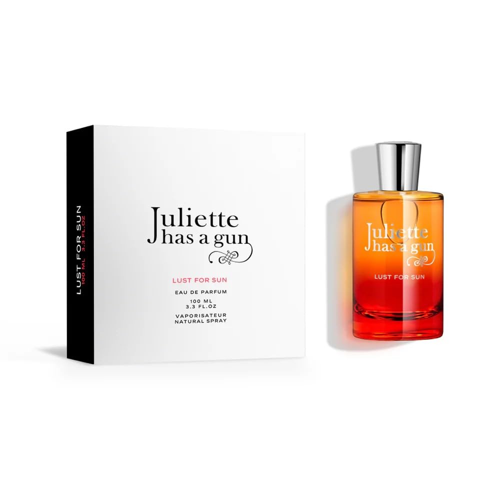 Juliette Has A Gun Lust for Sun bottle-cap close-up suggests premium sun-kissed allure.