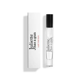 Juliette Has A Gun Lust for Sun bottle closeup highlighting radiant glow, summer nostalgia, and warmth.