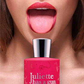 Juliette Has A Gun Mmmm bottle label and glass bottle for premium vanity appeal.