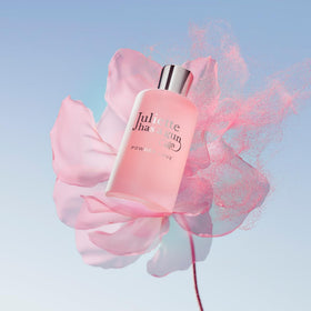 Close-up of Powder Love cap shows premium finish and branding.