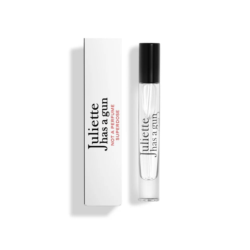 Juliette Has A Gun Superdose bottle, a sleek clear vessel for unisex wear.