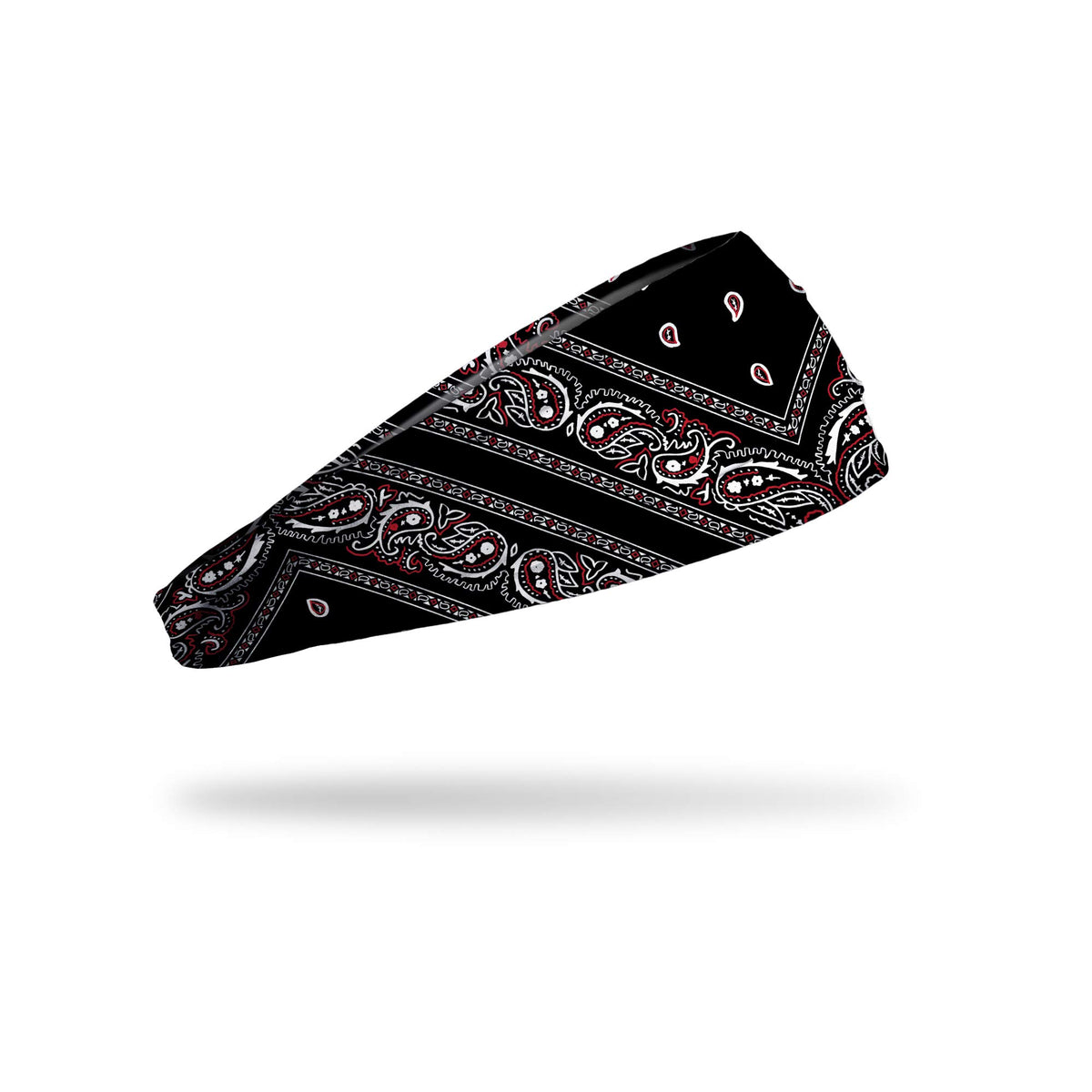 JUNK Brands Big Bang Lite Headband on model demonstrating non-slip fit during cardio