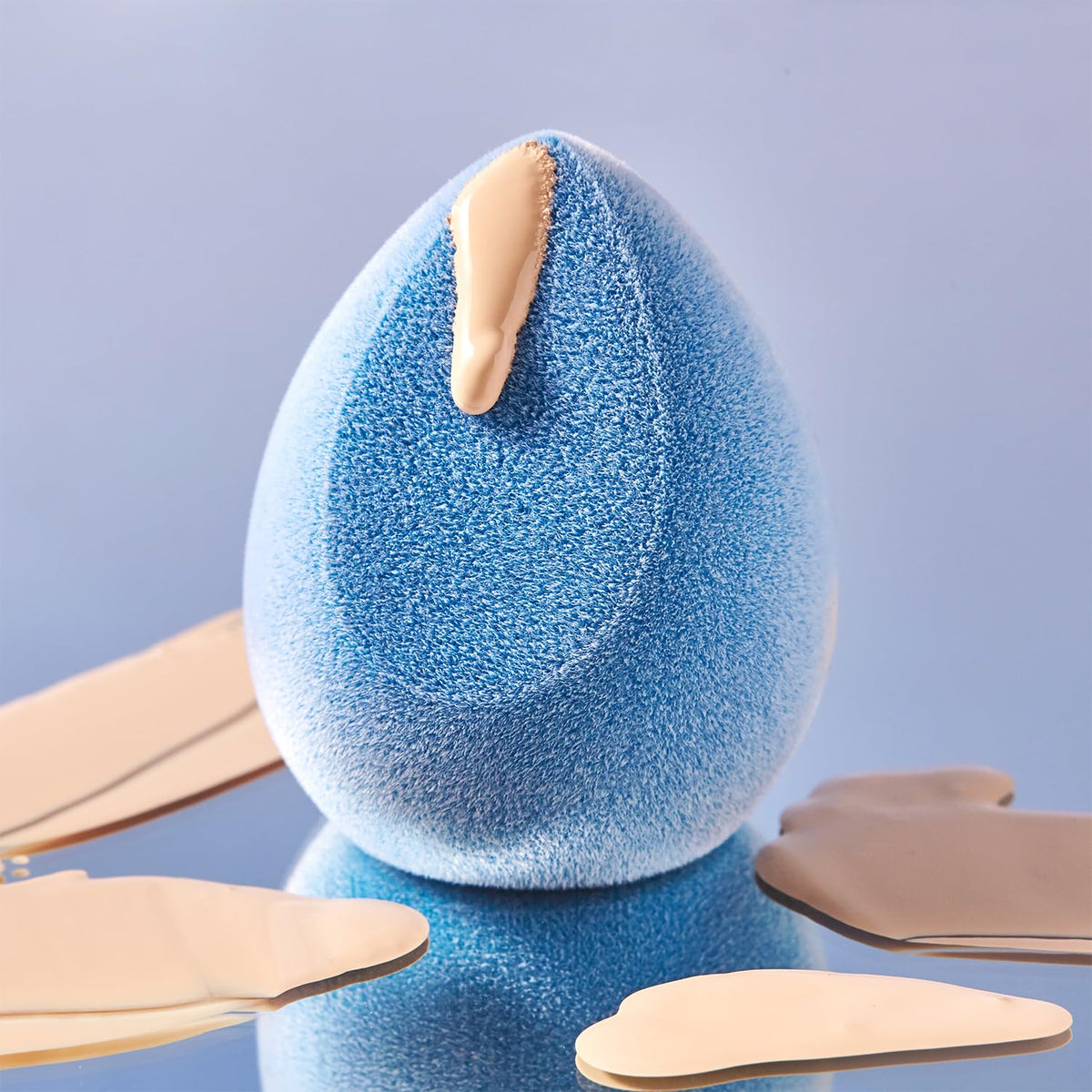 JUNO & Co. dual-layer first layer detail reducing product absorption on sponge