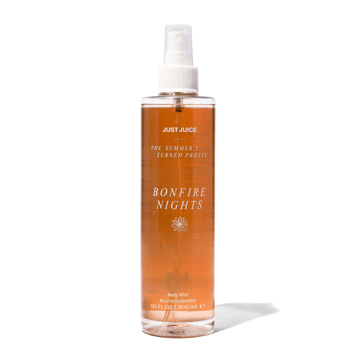 Just Juice Bonfire Nights bottle pour highlights warm, inviting evening fragrance.
