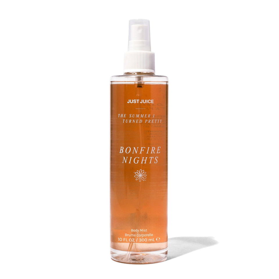 Just Juice Bonfire Nights bottle pour highlights warm, inviting evening fragrance.
