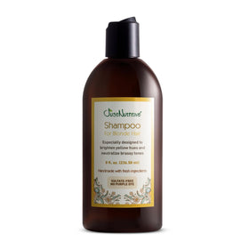 Just Nutritive Blonde Shampoo bottle close-up highlighting color-safe formula for brassy tones