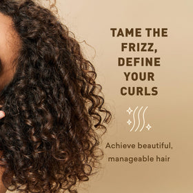 Close-up of Just Nutritive Herbal Gel defining curls without crunch