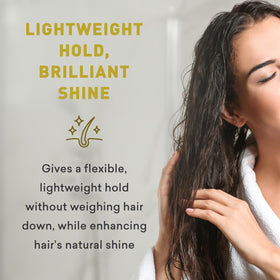 Humidity scene with Just Nutritive Herbal Gel reducing frizz