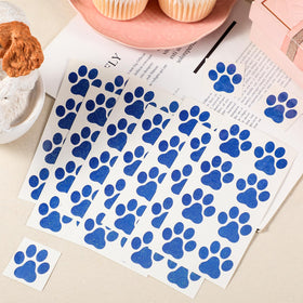 Jutom 30-sheet pack of blue dog paw tattoos ready for sharing.