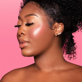 Rosey Posey Glow swirled on cheek to reveal radiant shimmer