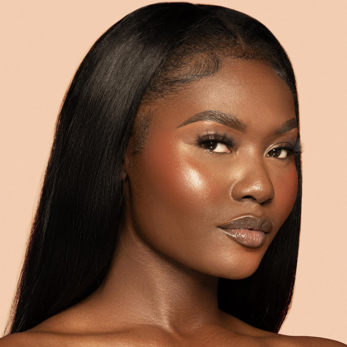 Juvia's Place Bronzed Duo swatch on cheek demonstrating soft matte glow