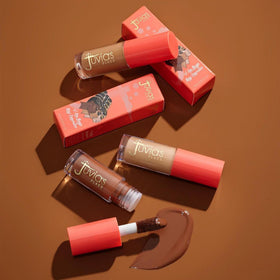 Juvia's Place I Am Magic Concealer J18 Medium Tan waterproof formula on skin during activity.