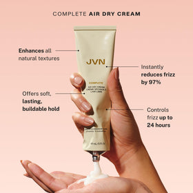 Close-up of JVN trusted trio packaging designed for travel.
